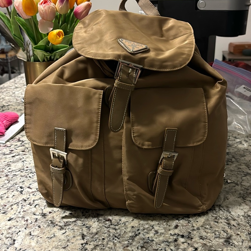 Women’s Prada mini back pack. All straps and buckles intactt and work great!